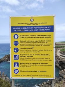 Cartel indicaciones COVID Playa de la Consolación